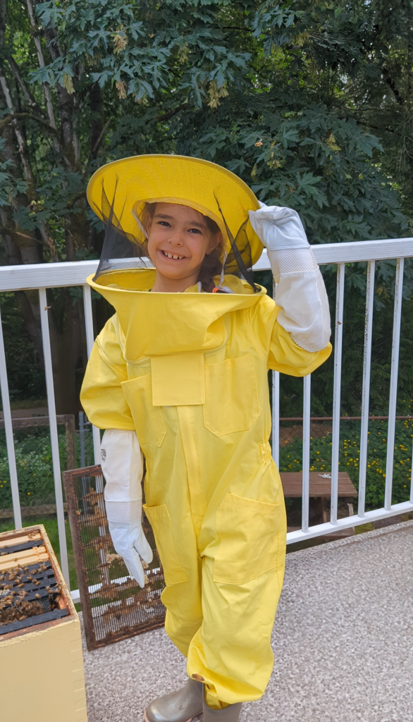 Adair in her beekeeping suit